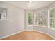 Cozy breakfast nook with large windows and tile flooring at 498 Pecan Wood Cir, Fairburn, GA 30213