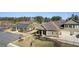 Aerial view of home, an office building, landscaping and parking at 57 Cedarcrest Village Ln, Acworth, GA 30101