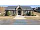 Clubhouse in community featuring parking spaces, sidewalks, and a meticulously maintained yard at 57 Cedarcrest Village Ln, Acworth, GA 30101