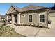 Home exterior showcasing green siding, manicured landscaping, and a concrete driveway at 57 Cedarcrest Village Ln, Acworth, GA 30101