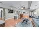 Spacious finished basement with a seating area and a wet bar at 3520 Millwater Xing, Dacula, GA 30019
