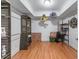 Spacious basement area with wood floor, ample storage, and great potential for customization at 3520 Millwater Xing, Dacula, GA 30019