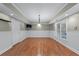 Large finished basement area with new wood floors and wainscotting at 3520 Millwater Xing, Dacula, GA 30019