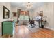 Bright bedroom with hardwood floors, natural light, and neutral decor at 3520 Millwater Xing, Dacula, GA 30019