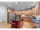 Stylish kitchen with stainless steel appliances, central island, and ample counter space at 3520 Millwater Xing, Dacula, GA 30019