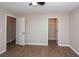 This bedroom features updated vinyl floors and a closet, making it move-in ready at 1184 Red Oak Cv, Tucker, GA 30084