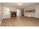Spacious living room with a cozy fireplace and sliding glass doors at 1184 Red Oak Cv, Tucker, GA 30084