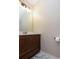 Tastefully designed powder room with a modern vanity and elegant fixtures at 1184 Red Oak Cv, Tucker, GA 30084