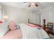 Spacious bedroom with a plush bed, side tables, and a doorway offers relaxation and privacy at 2060 Clairmeade Ne Way, Atlanta, GA 30329