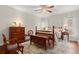 Charming bedroom with wood furnishings, a ceiling fan, and windows offers a comfortable retreat at 2060 Clairmeade Ne Way, Atlanta, GA 30329