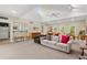 Spacious clubhouse features comfortable seating, a kitchenette, and large windows at 2060 Clairmeade Ne Way, Atlanta, GA 30329