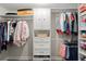 Organized walk-in closet with ample storage shelves and rods offers storage solutions at 2060 Clairmeade Ne Way, Atlanta, GA 30329