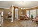 Inviting foyer with hardwood floors, archway accents, and natural light at 2415 Carina Nw Ter, Acworth, GA 30101