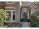 Elegant entryway showcasing a stone facade, decorative door, and manicured landscaping at 2415 Carina Nw Ter, Acworth, GA 30101