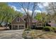 Charming home featuring a well-maintained lawn, a two-car garage, and tasteful landscaping at 2415 Carina Nw Ter, Acworth, GA 30101