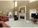 Spacious living room with a cozy fireplace and ample natural light at 2415 Carina Nw Ter, Acworth, GA 30101