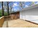 Newly constructed wooden deck along the side of the brick home at 6175 Knights Ln, Douglasville, GA 30135