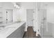 Modern bathroom featuring double vanity, a glass enclosed shower, and neutral tile flooring at 699 Pryor Sw St # 4, Atlanta, GA 30315