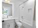 Modern bathroom featuring herringbone tiling, a shower, and a vanity at 699 Pryor Sw St # 4, Atlanta, GA 30315