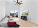 Living room with high ceilings, hardwood floors, a TV, and sliding glass doors to an outdoor space at 699 Pryor Sw St # 4, Atlanta, GA 30315