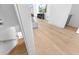 Bright open-concept living room with wood floors and a modern staircase at 699 Pryor Sw St # 4, Atlanta, GA 30315
