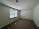 Bedroom with carpeted floor, window with blinds, and recessed lighting at 802 Crow View Ct, Woodstock, GA 30189