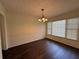Bright dining room with wood floors, neutral paint, and lots of natural light at 802 Crow View Ct, Woodstock, GA 30189
