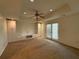 Living room features carpet, recessed lighting, fan, and built in shelving at 802 Crow View Ct, Woodstock, GA 30189