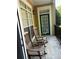 Inviting balcony with rocking chairs, perfect for enjoying a relaxing outdoor space at 1106 Stratford Commons, Decatur, GA 30033