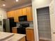 Eat-in kitchen featuring stainless steel appliances and ample cabinet space next to a pantry at 1106 Stratford Commons, Decatur, GA 30033
