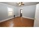 Spacious bedroom with tile flooring, ample natural light, and a ceiling fan at 1852 E Farris Ave, Atlanta, GA 30344