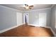 Spacious living room featuring wood-look floors and neutral paint, offering a versatile living space at 1852 E Farris Ave, Atlanta, GA 30344