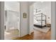 View from hall of primary bathroom and bedroom suite, with walk-in shower at 803 Courtenay Ne Dr, Atlanta, GA 30306