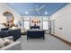 Bedroom with blue ceiling, nautical decor, neutral carpet, and a large window at 803 Courtenay Ne Dr, Atlanta, GA 30306