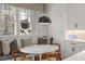 Charming breakfast nook with banquette seating, natural light, and a view of the outdoors at 803 Courtenay Ne Dr, Atlanta, GA 30306
