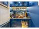 Wet bar boasts custom cabinetry, wine storage, beverage cooler, and plenty of bottle storage at 803 Courtenay Ne Dr, Atlanta, GA 30306