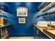 Stylish wet bar area with custom cabinetry, wine storage, and a sink for entertaining at 803 Courtenay Ne Dr, Atlanta, GA 30306