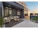 Stylish outdoor patio with comfortable seating, a rug, and a view at 180 Railroad St, Canton, GA 30114
