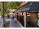 Exterior of Downtown Kitchen, featuring outdoor seating and a sidewalk view at 180 Railroad St, Canton, GA 30114