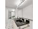 Modern bathroom featuring granite countertop, large mirror and checkered flooring at 3186 Sugarplum Ne Rd, Atlanta, GA 30345