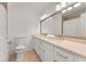 Bathroom includes dual sinks, tan countertops, and ample counter space at 3186 Sugarplum Ne Rd, Atlanta, GA 30345