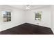 Sunny bedroom with two bright windows and warm wood floors at 3186 Sugarplum Ne Rd, Atlanta, GA 30345