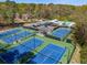 Aerial view of the community featuring tennis courts and swimming pool at 3186 Sugarplum Ne Rd, Atlanta, GA 30345
