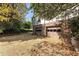 Spacious driveway leading to a brick and siding house with a two-car garage at 3186 Sugarplum Ne Rd, Atlanta, GA 30345
