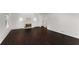 Bright living room with hardwood floors and a charming white fireplace at 3186 Sugarplum Ne Rd, Atlanta, GA 30345