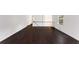 Bright and airy living room features dark wood floors, fresh paint, and large windows at 3186 Sugarplum Ne Rd, Atlanta, GA 30345