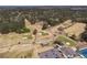 Aerial view of a golf course, community amenities, and residential area at 404 Willow Way, Villa Rica, GA 30180
