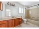 Bathroom features a single vanity and a shower and tub combination at 404 Willow Way, Villa Rica, GA 30180