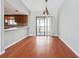 Dining area with wood floors, natural light, and open kitchen access at 404 Willow Way, Villa Rica, GA 30180