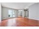 Bright living room with wood floors, large windows, and ample natural light at 404 Willow Way, Villa Rica, GA 30180